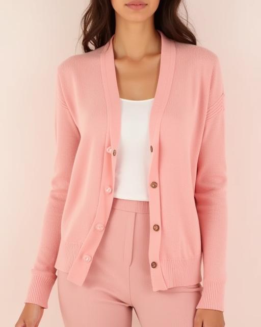 Lightweight knit cardigan in soft pink, perfect for layering.